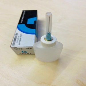 May include: A clear plastic bottle with a white cap and a needle-like applicator. The bottle is labelled "HYPO - 250" and "GAUNT".