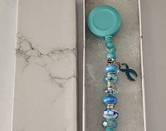 Awareness Beaded Badge Clip/reel - Cervical cancer, Ovarian cancer, PCOS, Trisomy 18, PMDD, Pots, PTSD, Sexual Assault