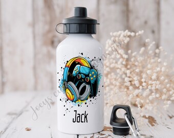 May include: White aluminum water bottle with a colorful graphic of a video game controller and headphones. The bottle has a black lid and a black carrying loop. The name "Jack" is printed on the bottle.