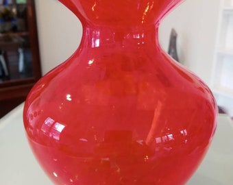 Transparent red vase