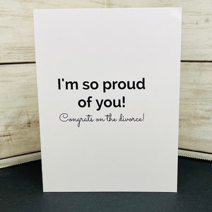 May include: White card with black text that reads "I'm so proud of you! Congrats on the divorce!"
