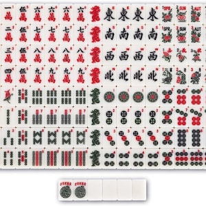 May include: A complete set of white Mahjong tiles with red, black, and green markings. The tiles feature Chinese characters, numbers, and symbols. Includes Joker tiles. A classic game.