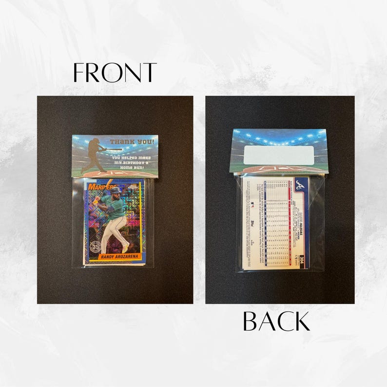 May include: A baseball card favor bag with a baseball card of Randy Arozarana, a baseball player for the Seattle Mariners. The front of the bag has a thank you note that says "Thank you! You helped make my birthday a home run!" The back of the bag has a baseball card with statistics for the Atlanta Braves.