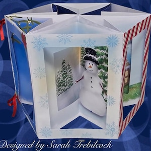 Peut inclure: Décoration de Noël en papier à facettes multiples avec des scènes intérieures festives, dont un bonhomme de neige et un sapin de Noël. Le design présente des bords rayés rouges et blancs, des motifs de flocons de neige et le texte "TÉLÉCHARGEMENT NUMÉRIQUE PDF & JPEG".