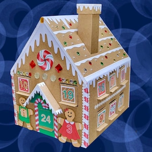 May include: A cardboard gingerbread house advent calendar with 24 numbered windows. The house is decorated with candy canes, red and green sprinkles, and rhinestones. There are gingerbread people on either side of the house.