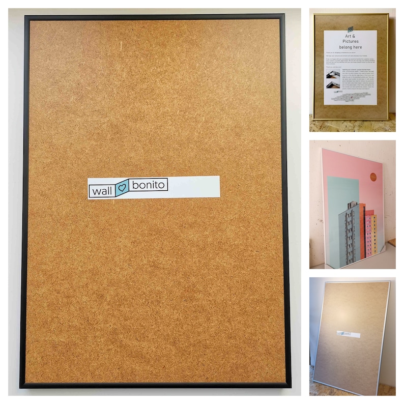 May include: A black framed corkboard with a white label that says "wall &hearts; bonito". The corkboard is brown and has a textured surface.