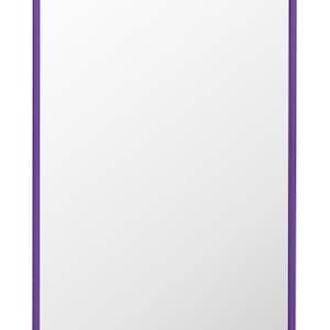 May include: A rectangular mirror with a vibrant purple frame. The frame is a solid color, and the mirror's surface is a clean, bright white. The design is simple and modern, suitable for various decor styles.