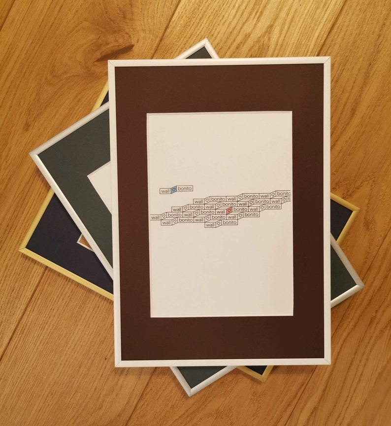 May include: A brown picture frame with a white mount and a white background. The background has the words "wall" and "bonito" repeated in a pattern.