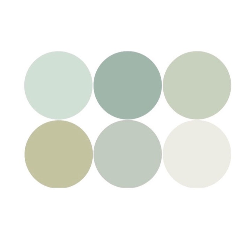 May include: Six round paint color swatches in shades of green and white. The colors are arranged in two rows of three.