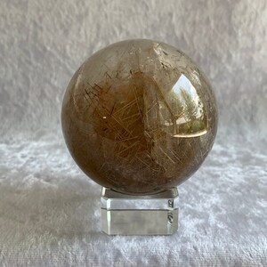 Stunning Rutilated Smoky Quartz Sphere with Stand