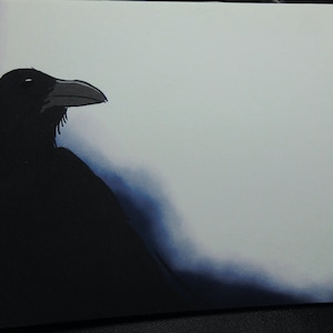 May include: A black crow with a dark beak is silhouetted against a white background with a blue gradient.