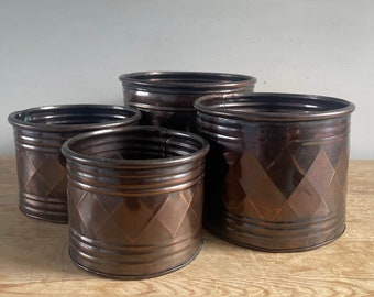 Vintage set of four matching graduated bronze planters