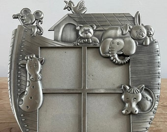 Vintage pewter children's photo frame holding four photos