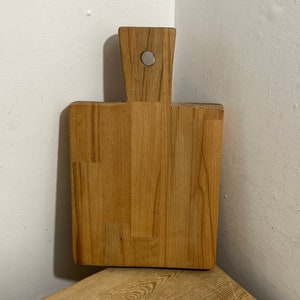 Vintage rustikales handgemachtes Holz Schneidebrett