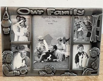 Vintage 'Our Family' pewter photo frame holding five photos