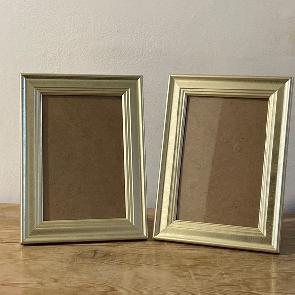 Pair of brushed gold photo frames