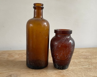 Vintage set of two brown glass bottles