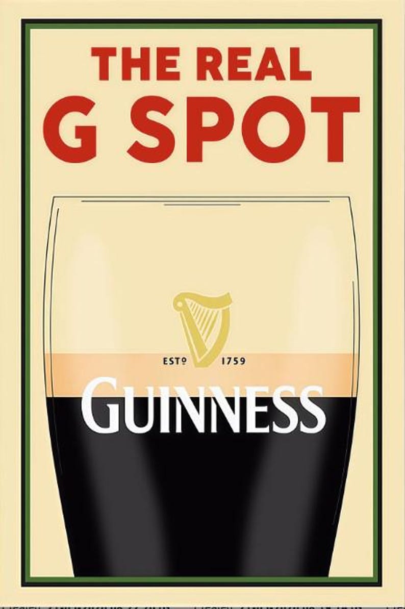 May include: Poster with a cream background and a green border. The text "THE REAL G SPOT" is in red. Below is a pint of Guinness with the brand name in white and the harp logo. The text "ESTD 1759" is also visible.