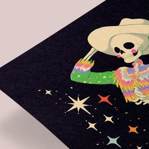 a mexican skeleton wearing a sombrero and holding a drink