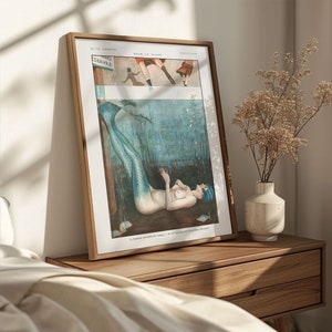 a picture of a woman laying on a bed next to a vase with flowers