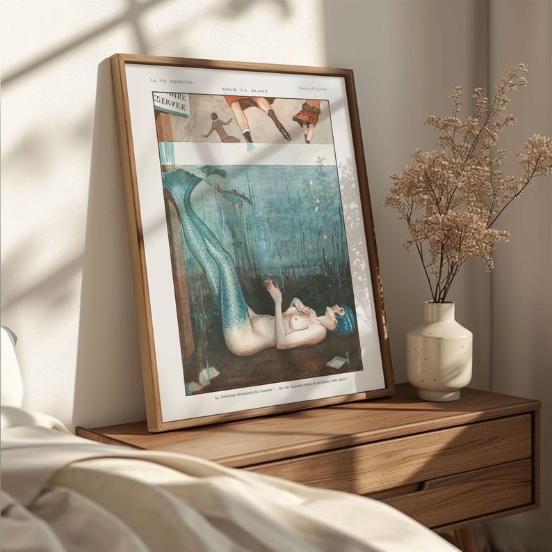 a picture of a woman laying on a bed next to a vase with flowers