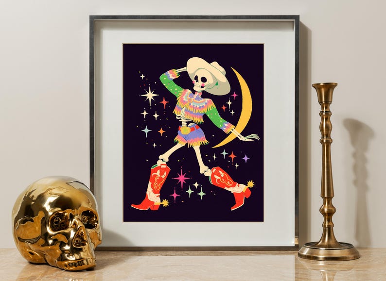 a picture of a skeleton and a gold skull