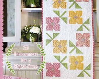 Tablerunner Bliss Quilt Pattern Book....This is BY FAR my favorite quilt book.  20 tablerunner patterns