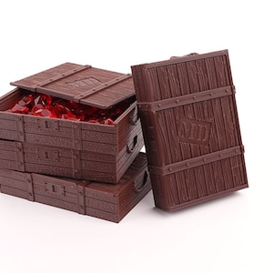 May include: Four brown wooden treasure chests with a metal latch and hinges. One chest is open and filled with red gems.