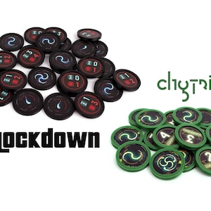 May include: Two sets of game tokens. One set is black with red and blue numbers and a swirling design. The other set is green with black numbers and a swirling design. The text "Lockdown" and "cliyntrid" are visible.