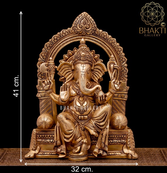 Gangesindia Sitting Ganpati Brass Statue in Brown Finish Gangesindia Sitting Ganpati Brass Statue in Brown Finish