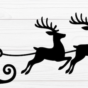 May include: A black silhouette depicts Santa Claus in a sleigh, drawn by three reindeer. Santa is waving, and the reindeer are in mid-flight, evoking a festive Christmas theme. The design is set against a white wood-grain background.