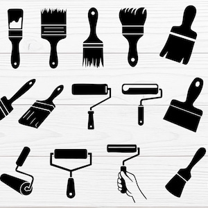 May include: A collection of black paintbrushes and paint rollers in various styles. The image includes different brush shapes, sizes, and roller designs, along with a paint can. The tools are arranged on a white wooden background.