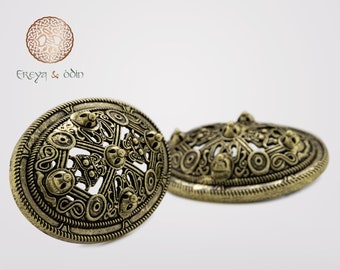 Paar Vikingbroches, type P51, brons- of zilverkleurig