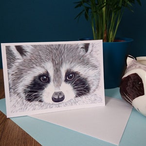 Une belle carte de vœux d’un mignon raton laveur