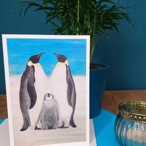 Une belle carte de vœux d’une famille de pingouins