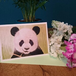 Een wenskaart met een leuke stoere grote panda