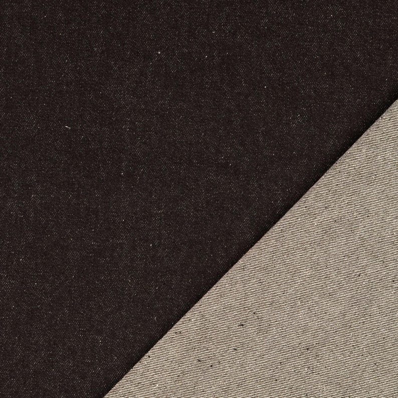 May include: A diagonal split image showcasing two distinct fabric swatches. One side displays a dark, almost black, textured denim. The other side reveals a lighter, beige-toned denim, offering a contrast in color and texture.