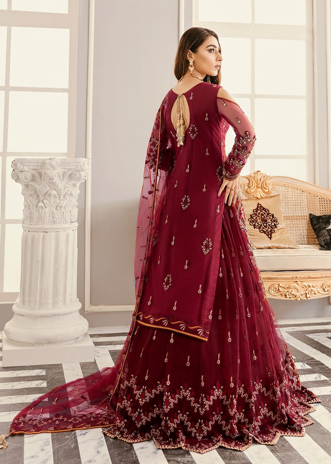 sherwani with red lehenga