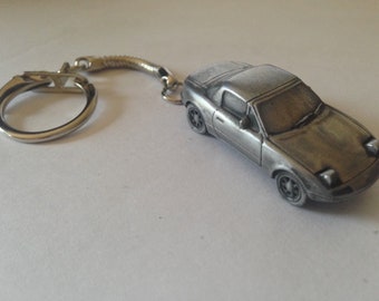 japan  sports classic car MX5 with hard top and raised head lamps ref124 car keyring  or pin badge classic car