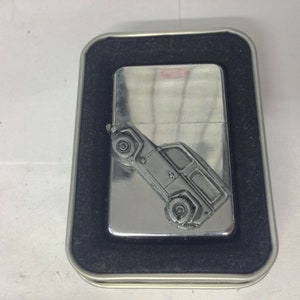 Defender  4x4  on a windproof Flip Top Petrol star brand Lighter Refillable codef46 silver black red gold green colour