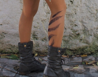 Tattoo Tights: Express your style with our unique tights in vibrant tattoo designs, this one exclusive features feather print.