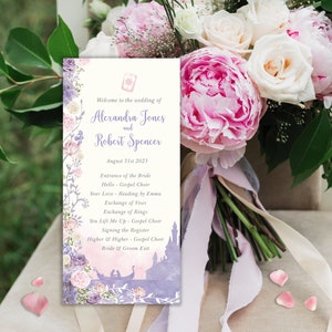 May include: A wedding ceremony order of service with a floral border and a watercolour illustration of a castle. The order of service lists the names of the bride and groom, Alexandra Jones and Robert Spencer, and the date of the wedding, 31st August 2023. The order of service also lists the order of events for the ceremony.