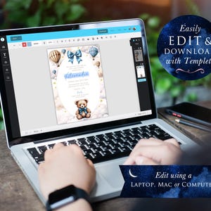 May include: A laptop computer displaying a blue and white baby shower invitation with hot air balloons and a teddy bear. The text on the invitation reads "Welcome Baby". The invitation is being edited using the Templett website.