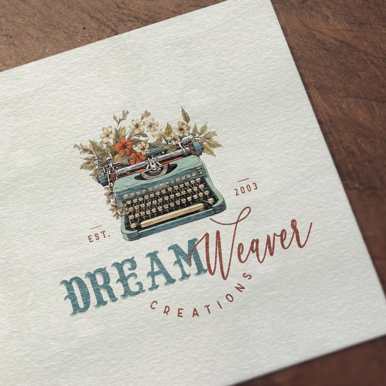 May include: A vintage typewriter with floral accents, surrounded by the text "EST. 2003 DREAM Weaver CREATIONS".