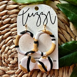 Abstract black, white and mustard circle earrings