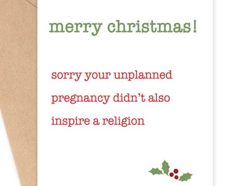 May include: A white Christmas card with green text that reads "merry christmas!" and red text that reads "sorry your unplanned pregnancy didn't also inspire a religion". A green holly sprig with red berries is in the bottom right corner.