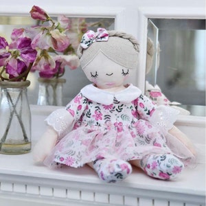 Personalised supersoft Rag Doll in a floral tutu dress with beautifully coordinated shoes and embroidered features. Traditional rag dolly