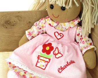 Personalised Rag Doll in a pink flowerpot designed dress with beautifully coordinated bunches and shoes. Traditional Rag Doll, Dolly