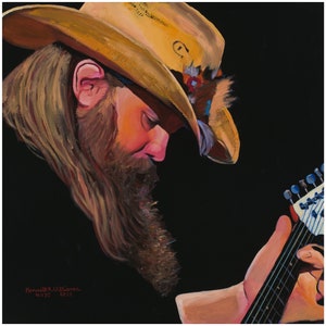 May include: A painting of a man with a long beard wearing a brown cowboy hat with feathers. He is playing a guitar with a black body and a light wood fretboard. The background is black.