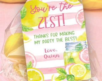 May include: Pink and white striped thank you tag with a watercolor illustration of lemons, limes, and a mason jar of lemonade. The text reads "You're the ZEST! Thanks for making my party the best! Love, Quinn."